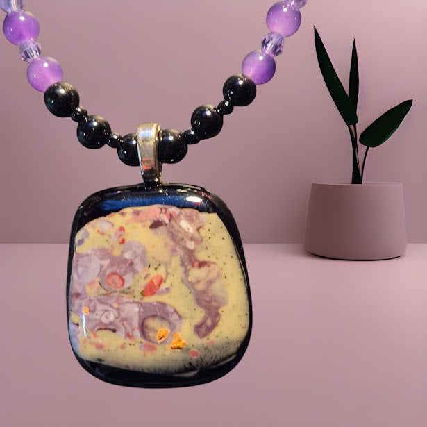 Heartfelt Creations handcrafted beaded necklace and bracelet set with purple and black glass beads
