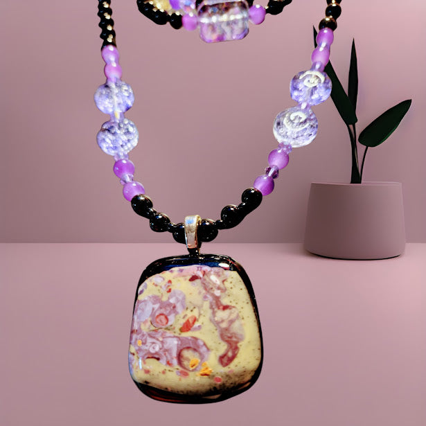 Heartfelt Creations handcrafted beaded necklace and bracelet set with purple and black glass beads 