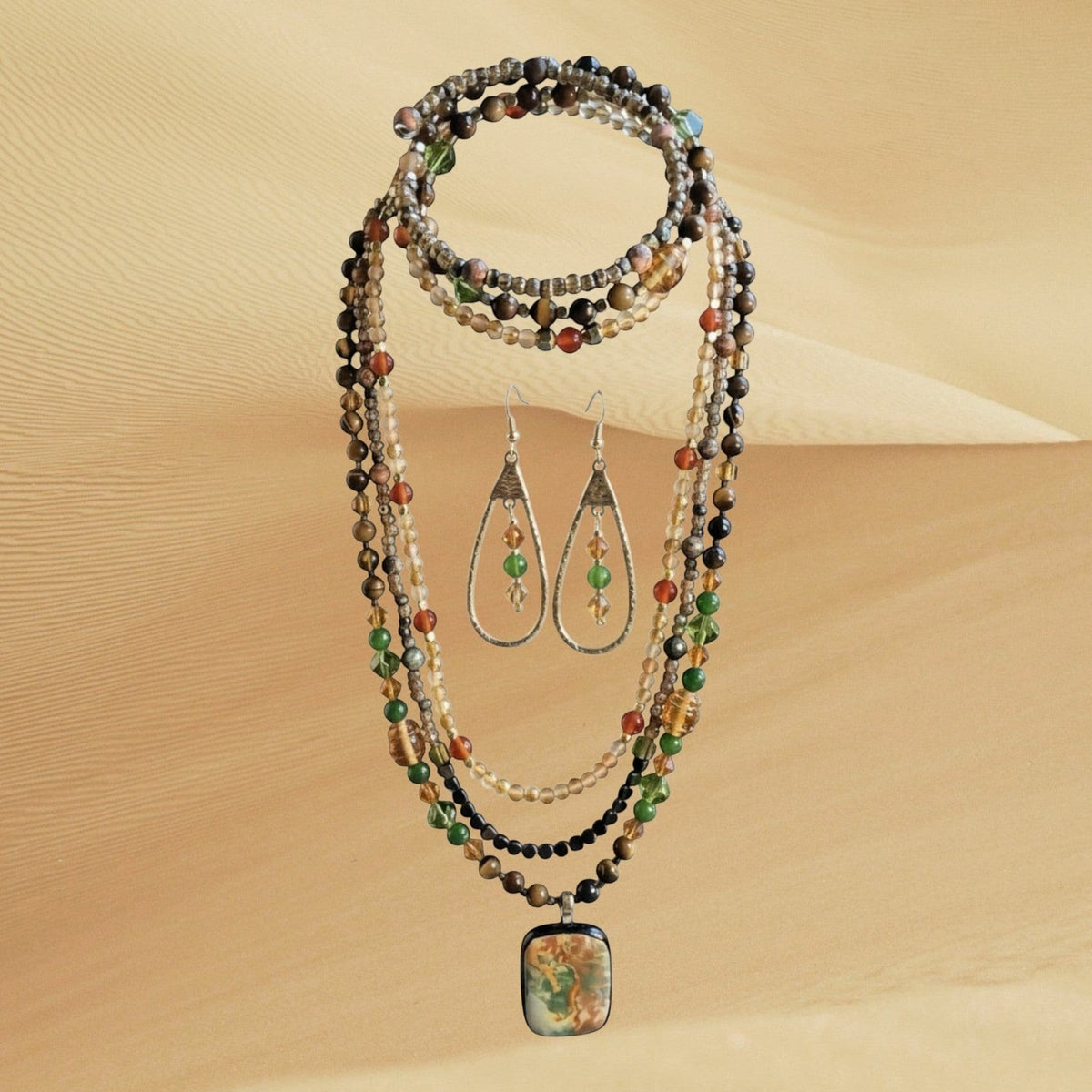 Heartfelt Creations multi-strand beaded necklace, wrap bracelet, and teardrop earrings with a handcrafted  fused glass pendant.  GEORGEOUS!!!