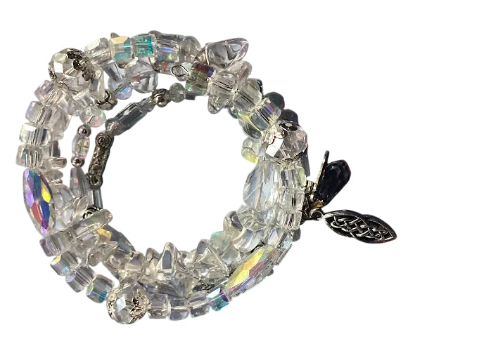 A Heartfelt Creations specialty!!!  A beaded, 4 layer wire bracelet featuring clear faceted crystal beads, silver-toned metal beads, and iridescent rhinestone accents.  Don't forget the silver charm!