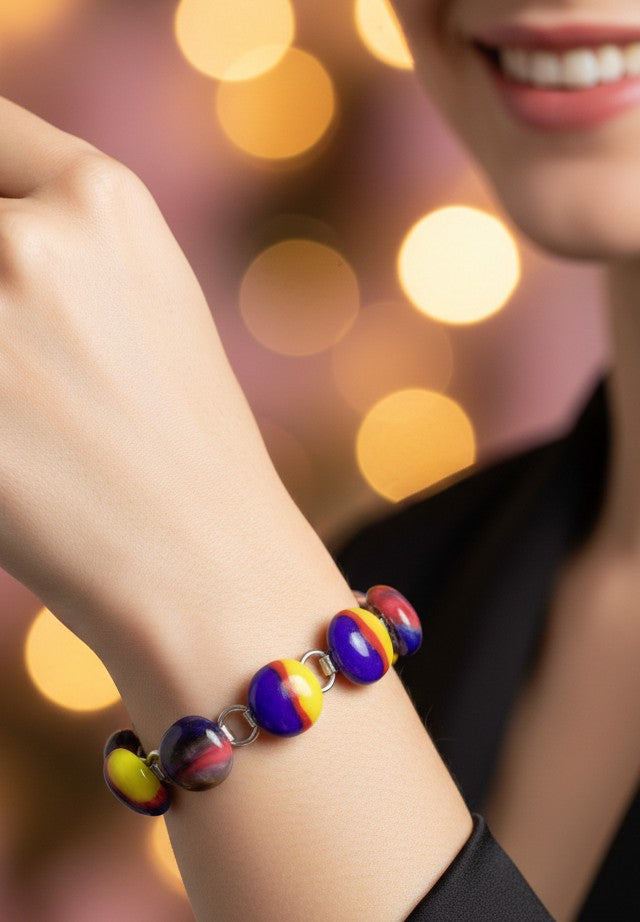 Colorful beaded bracelet on a yellow background