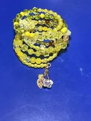 Beaded Coil Bracelet With Charms