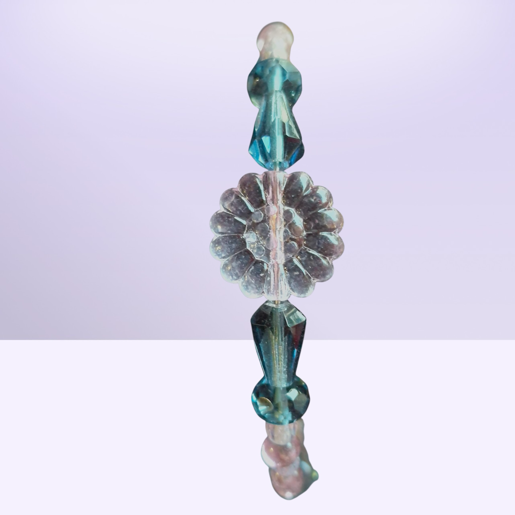 Heartfelt Creations handcrafted abalone shell flower pendant necklace and bracelet set with blue crystals and pink beads.