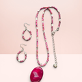 Heartfelt Creations fuchsia agate pendant necklace with pink gemstone beads and silver-tone accents, matching hoop earrings.