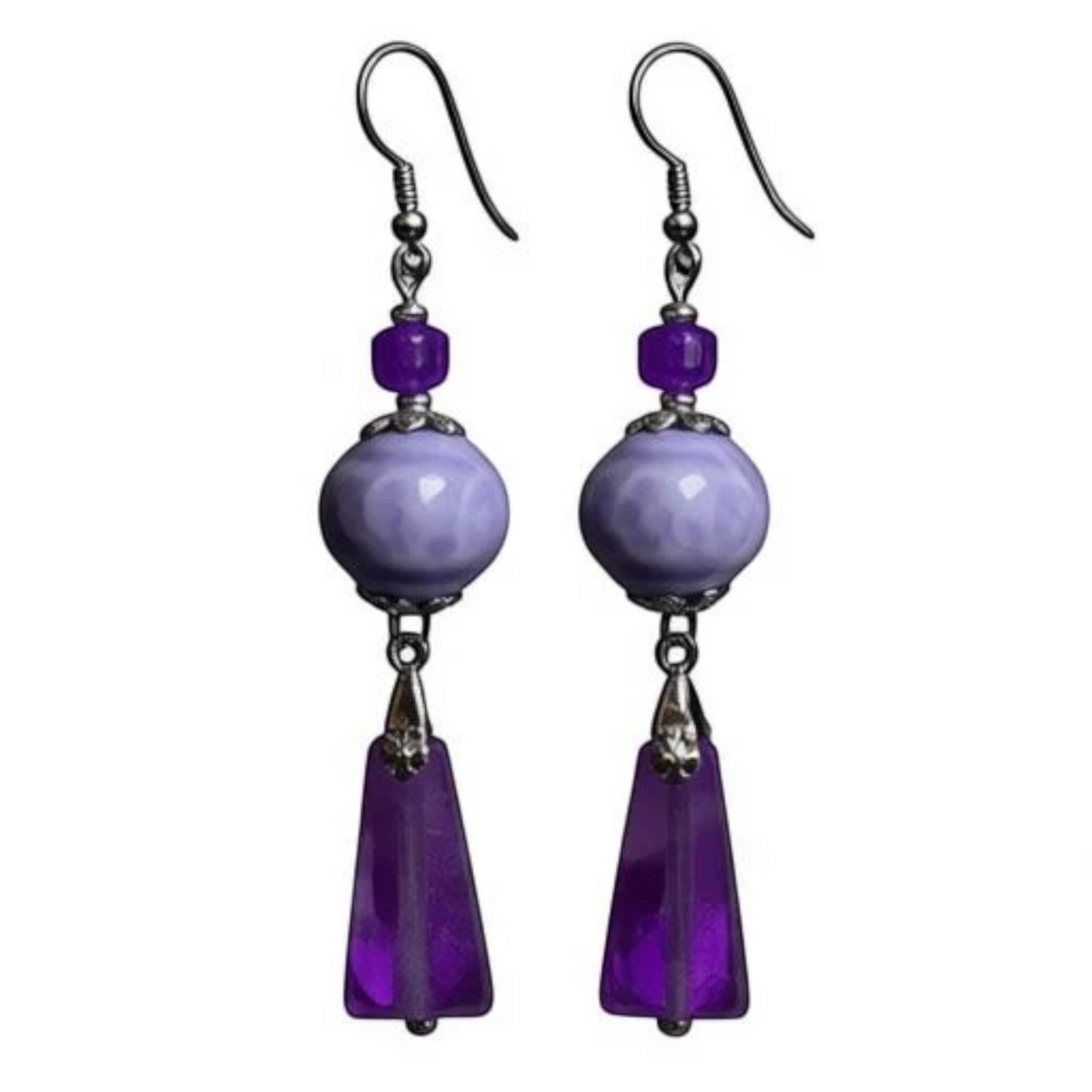 Heartfelt Creations floral dangle earrings featuring lilac ceramic beads, purple amethyst pendants, and silver hardware.
