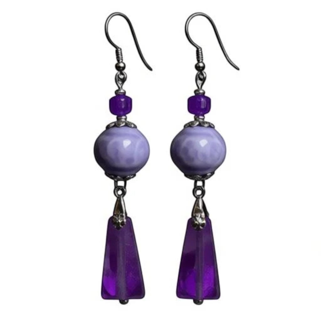 Heartfelt Creations floral dangle earrings featuring lilac ceramic beads, purple amethyst pendants, and silver hardware.