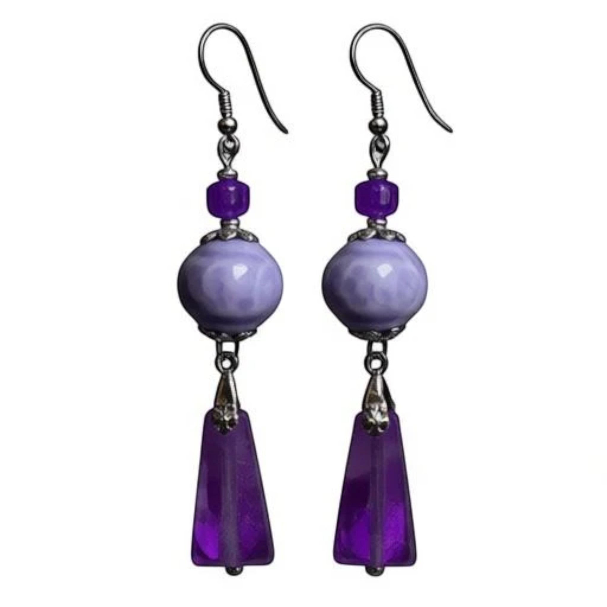 Heartfelt Creations floral dangle earrings featuring lilac ceramic beads, purple amethyst pendants, and silver hardware.