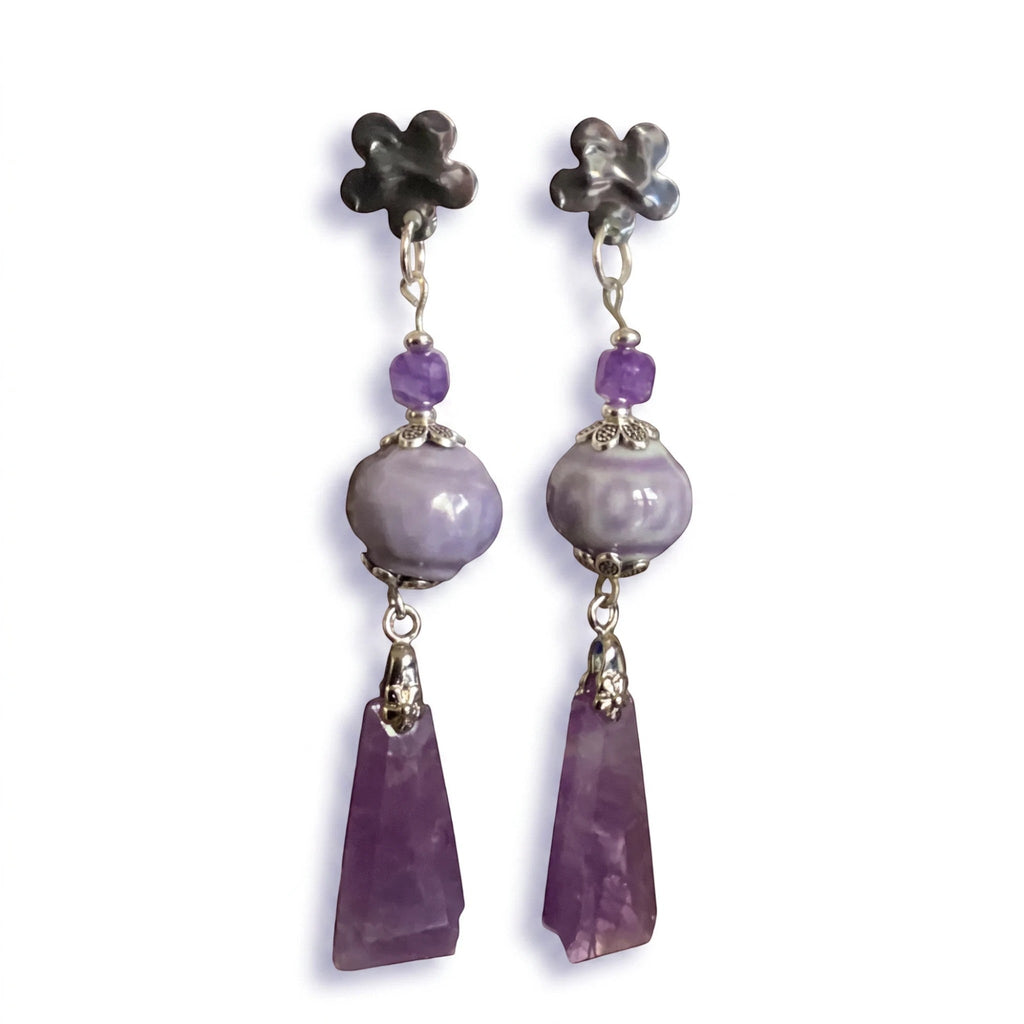 Heartfelt Creations floral dangle earrings with lilac ceramic beads, purple accent beads, and amethyst pendants.