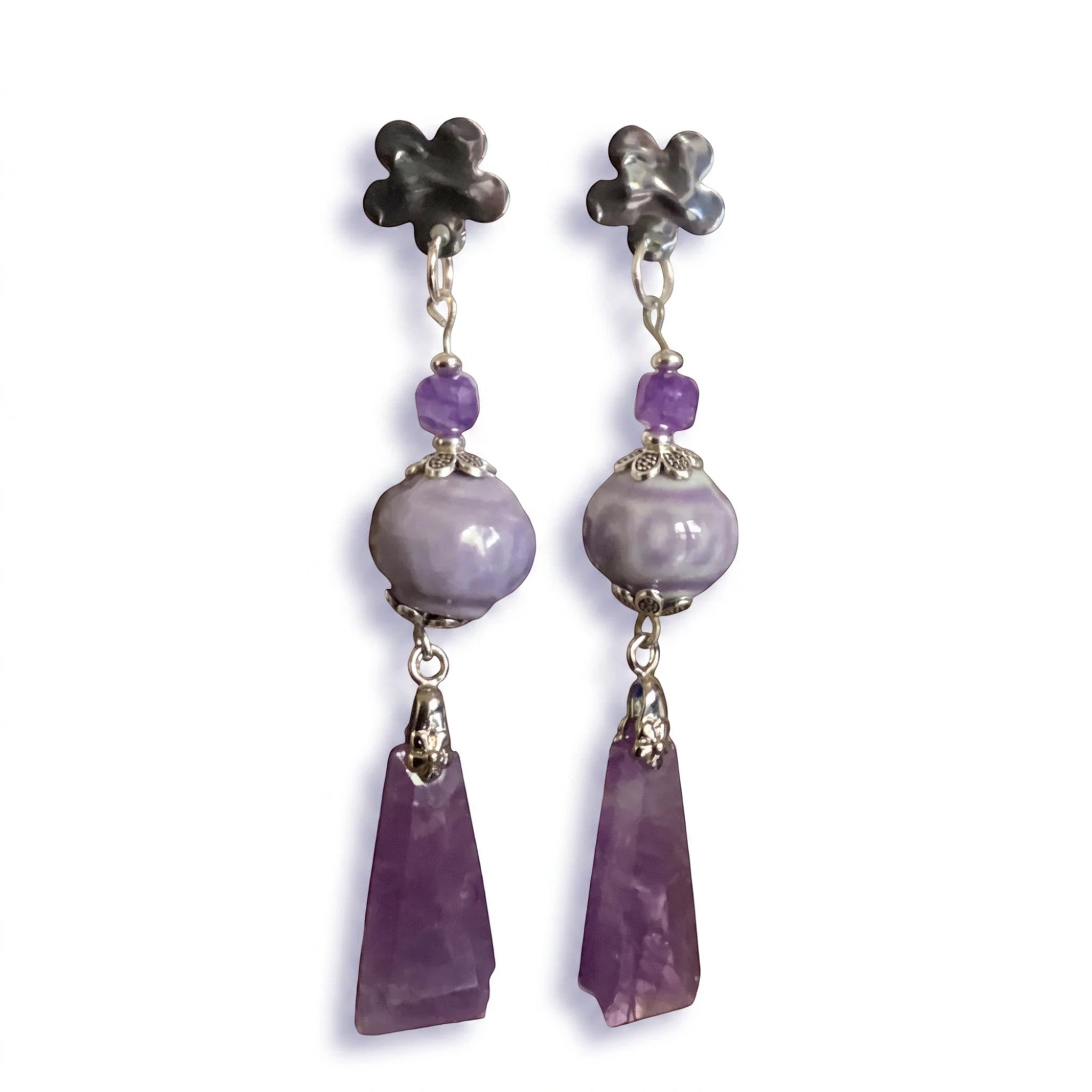 Heartfelt Creations floral dangle earrings with lilac ceramic beads, purple accent beads, and amethyst pendants.