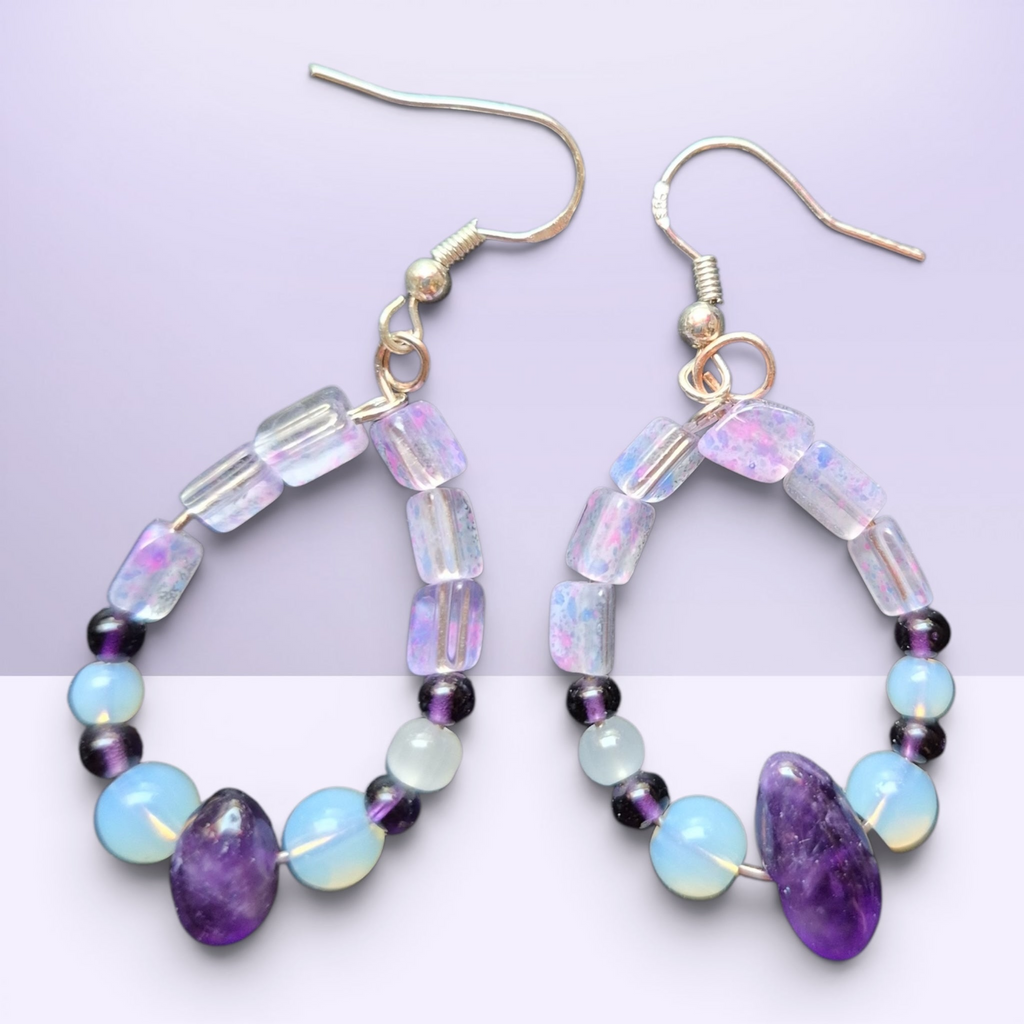 Heartfelt Creations bohemian drop earrings featuring amethyst, iridescent opal-style beads, and pearls on silver hooks.