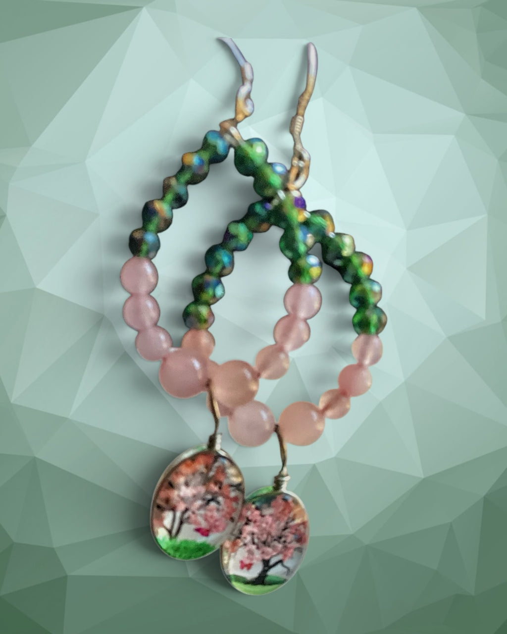 Heartfelt Creations beaded drop earrings with rose quartz, green crystal beads, and cherry blossom tree oval charms.