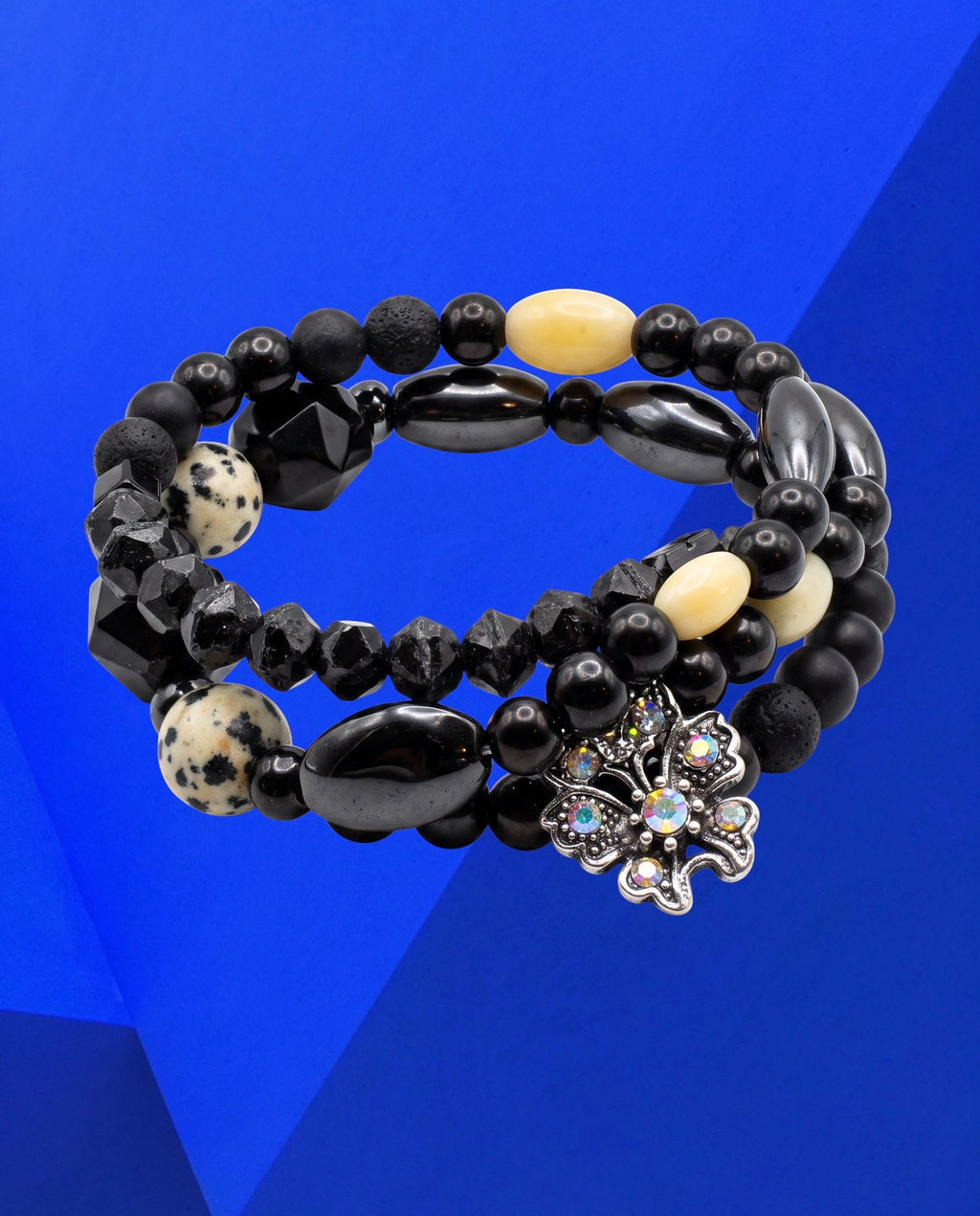 Heartfelt Creations black and white beaded wrap bracelet with Dalmatian Jasper stones and a shimmering butterfly charm.