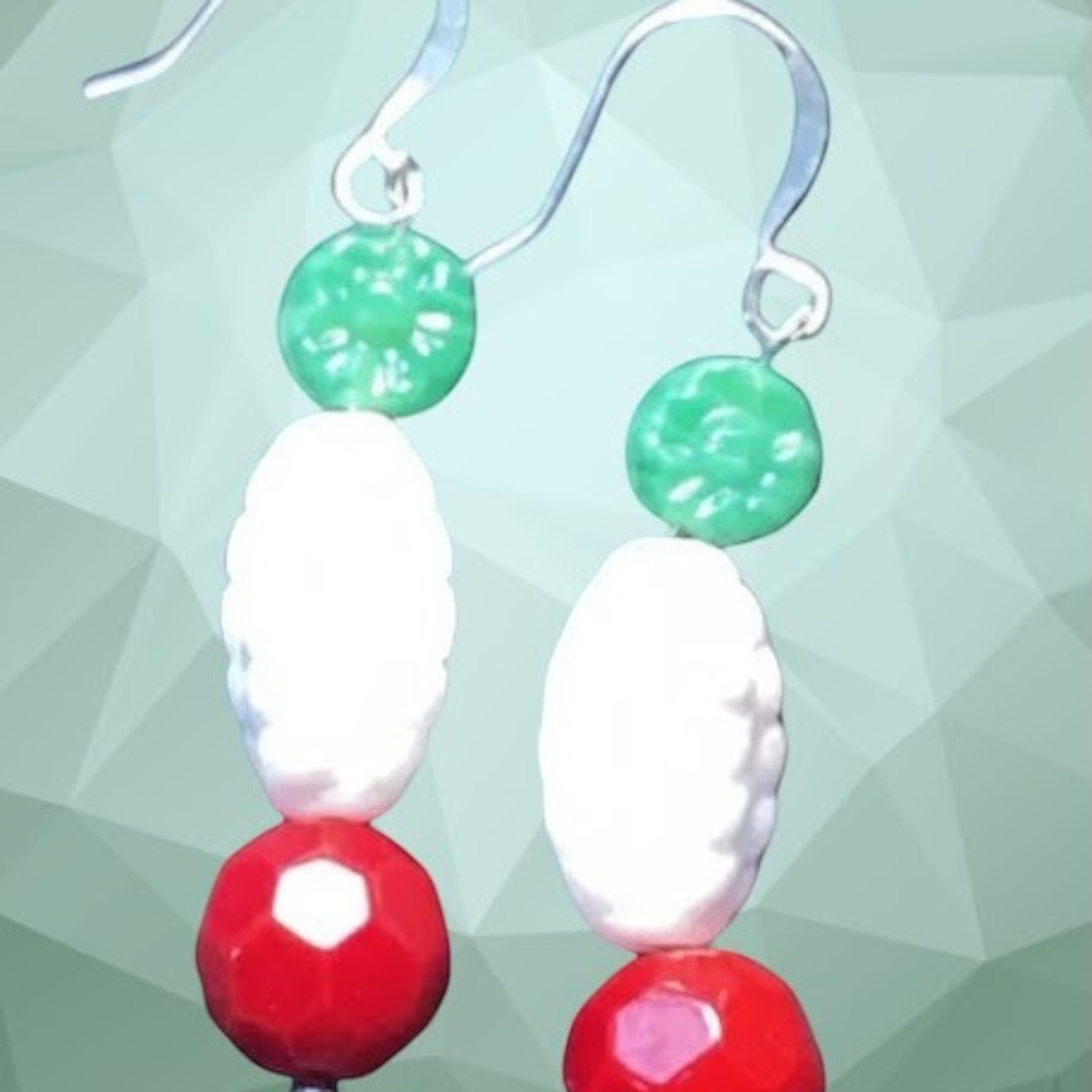 Heartfelt Creations handcrafted beaded earrings featuring red, white, and green beads in a festive cardinal-inspired set