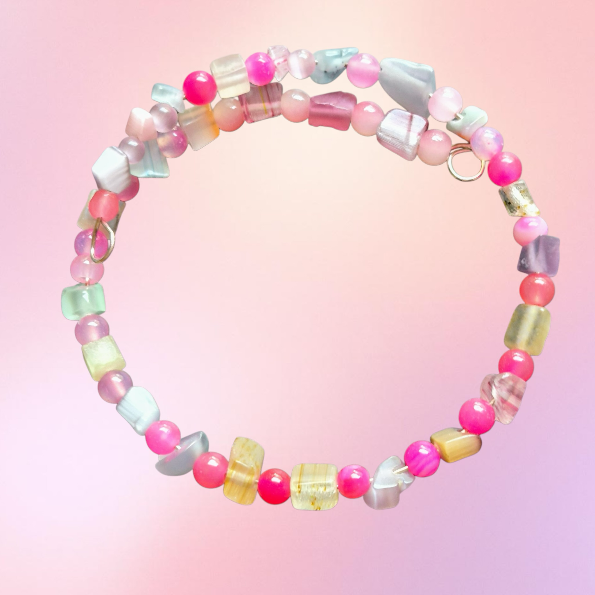Heartfelt Creations beaded charm bracelet with pink, lavender, blue, and yellow beads in various shapes. Silver-tone findings.