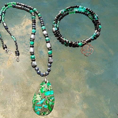 Heartfelt Creations artisan beaded necklace and bracelet set with pendant. Green, blue, and hematite beads with a teardrop pendant and rose charm.