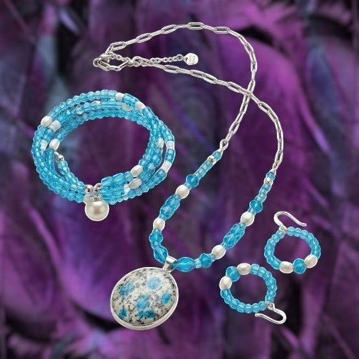 Heartfelt Creations handcrafted jewelry set with K2 blue azurite pendant, turquoise glass beads, and white faux pearls.