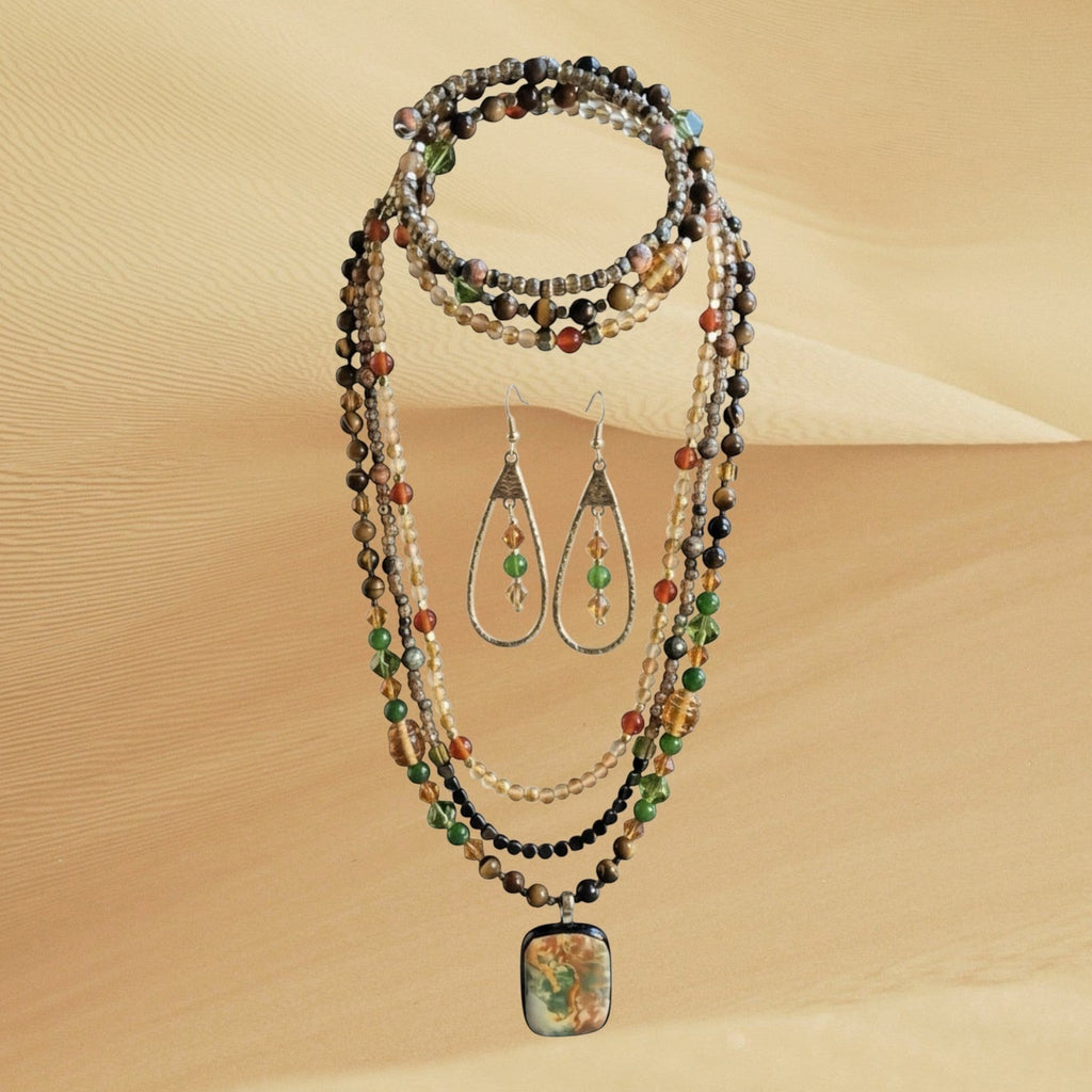 Heartfelt Creations multi-strand beaded necklace, wrap bracelet, and teardrop earrings with a marbled stone pendant.