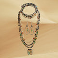Heartfelt Creations multi-strand beaded necklace, wrap bracelet, and teardrop earrings with a marbled stone pendant.