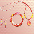 Heartfelt Creations handcrafted jewelry set featuring a red and yellow teardrop pendant necklace, wrap bracelet, and earrings.