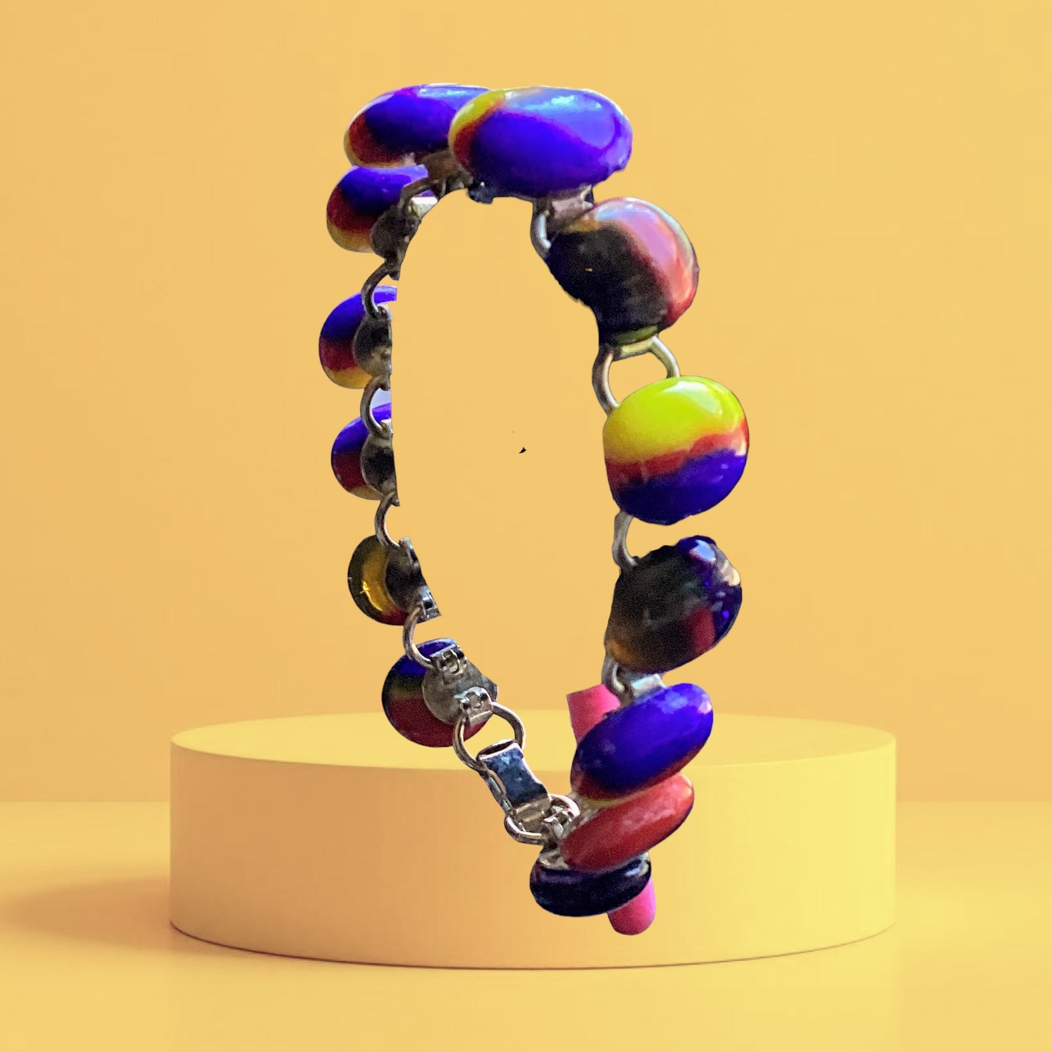 Heartfelt Creations artisan link bracelet with vibrant multi-colored glass beads and silver-tone metal links.