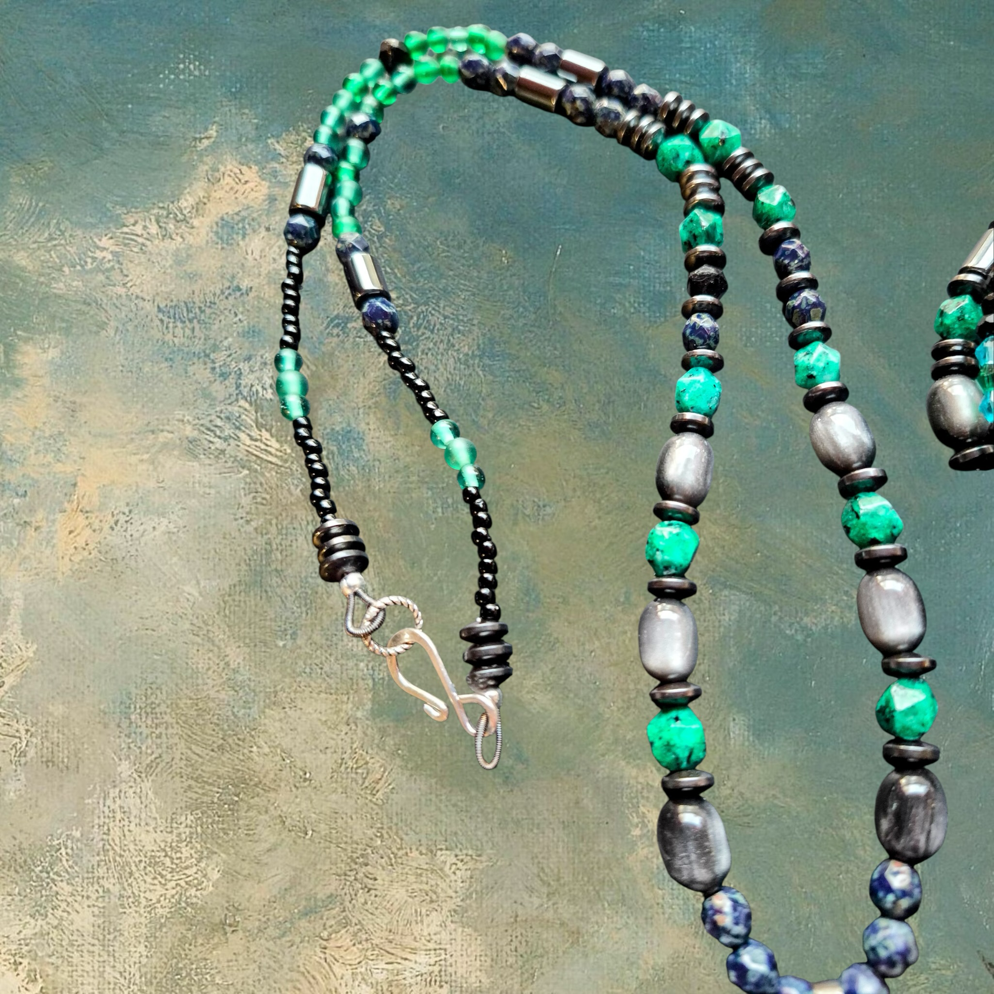 Heartfelt Creations artisan beaded necklace and bracelet set with green, blue, and grey stones, hematite, and crystals.