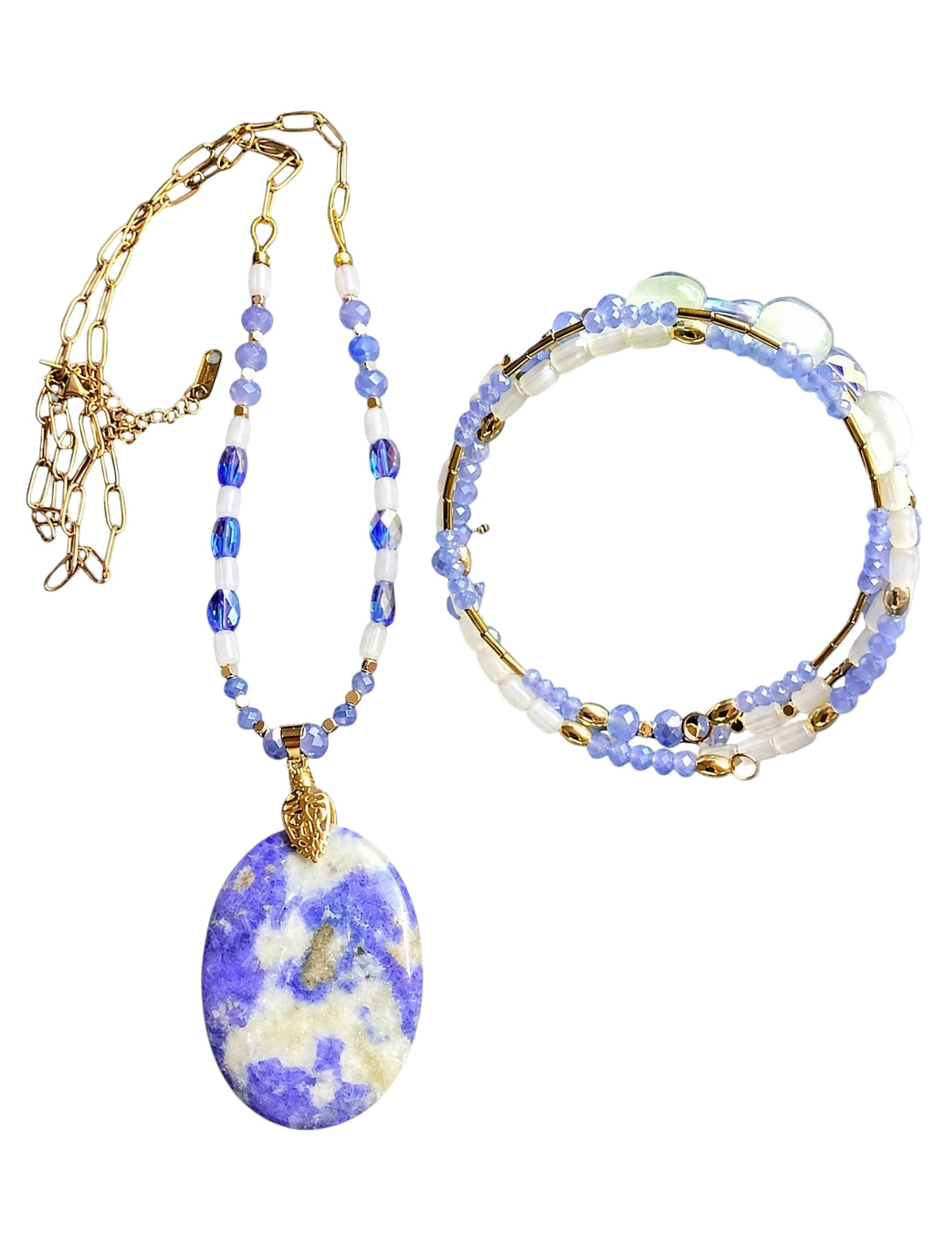 Heartfelt Creations artisan jewelry set featuring a violet stone pendant necklace and matching beaded wrap bracelet.