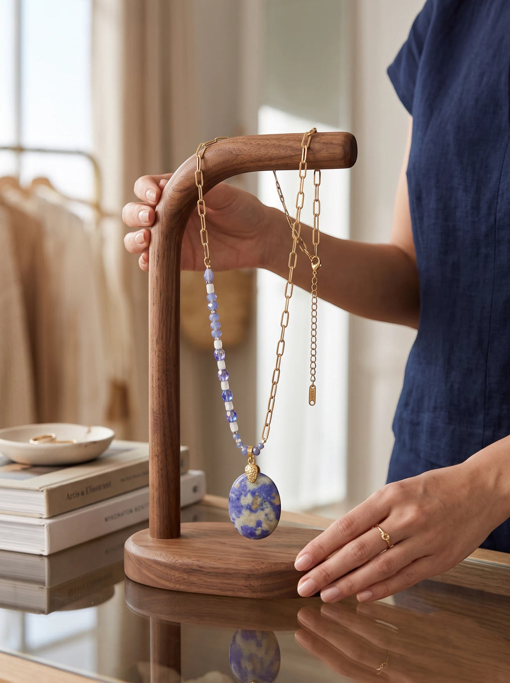 Heartfelt Creations artisan necklace featuring a violet and white oval stone pendant on a gold-tone chain with blue beads
