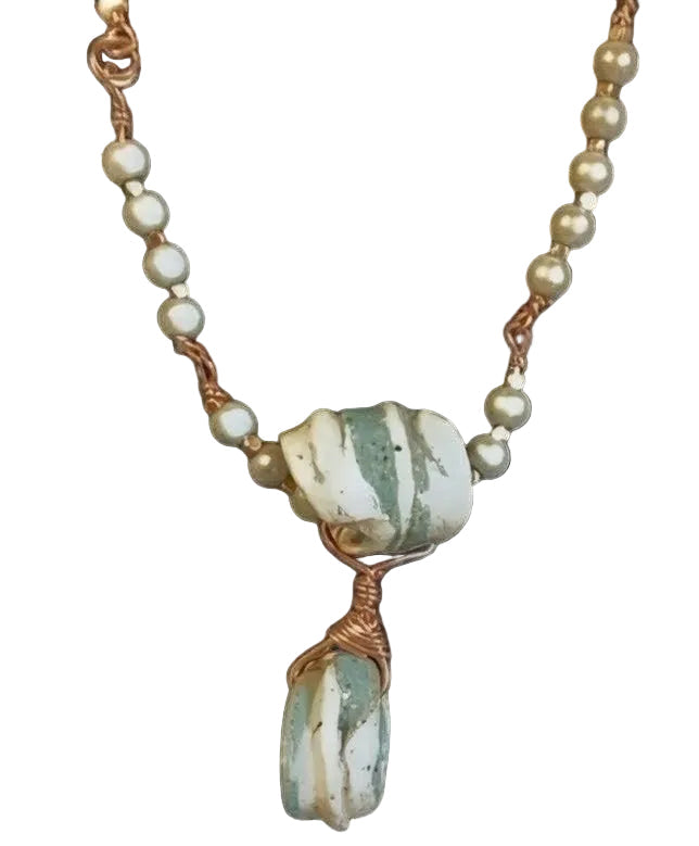 Heartfelt Creations handcrafted necklace with sage and cream sea-glass stones, copper wire wrapping, and pearl accents.
