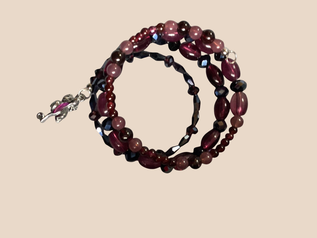 Heartfelt Creations wrap bracelet with burgundy, rose, and blue beads and a silver lizard charm.