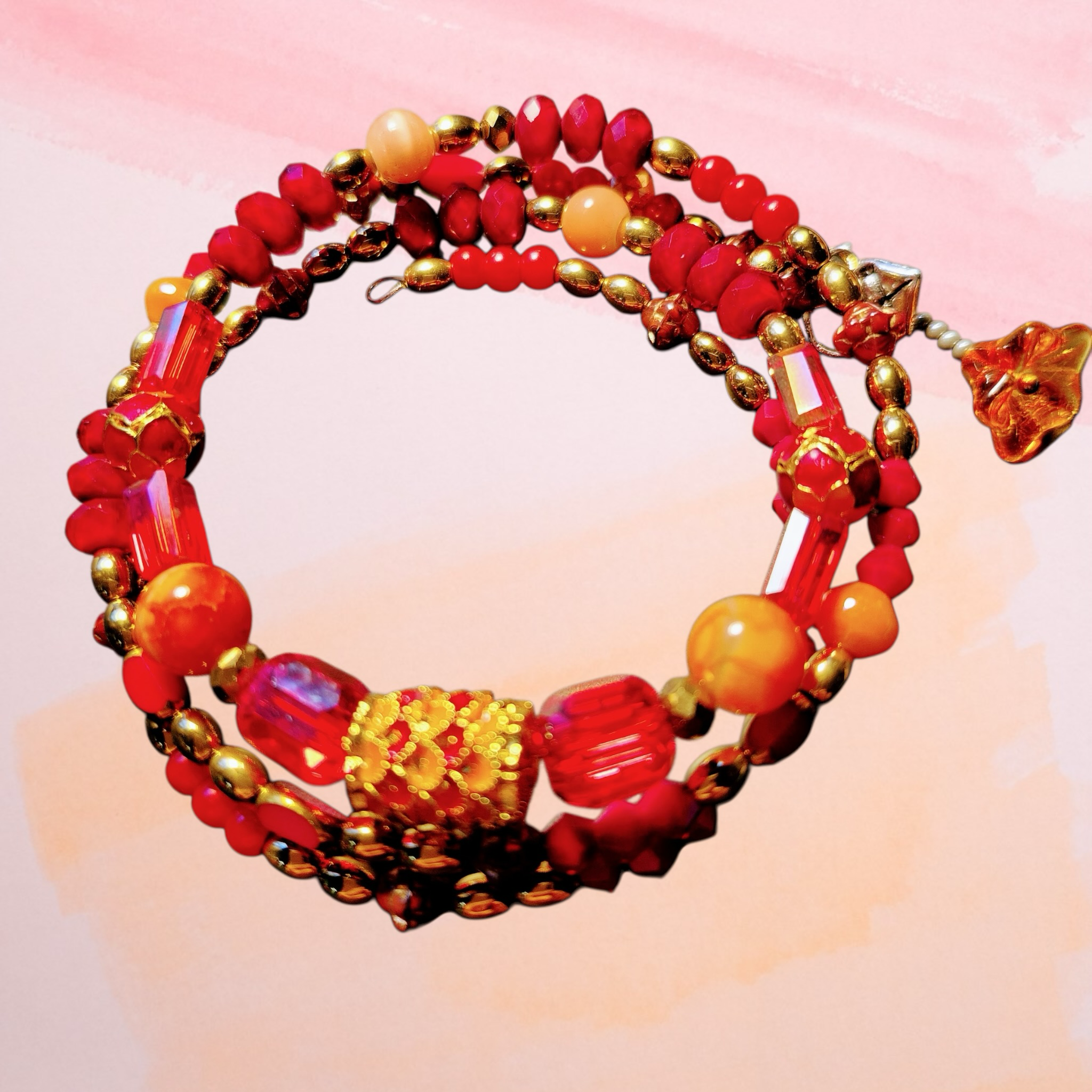 Heartfelt Creations beaded wrap bracelet with red, orange, and gold beads and a gold-tone charm.