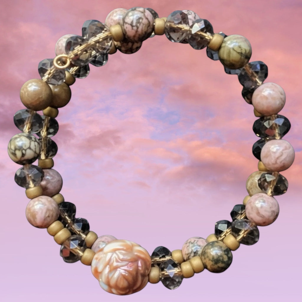 Heartfelt Creations handcrafted multi-layered wrap bracelet with pink marbled stone beads, crystals, and a floral charm.