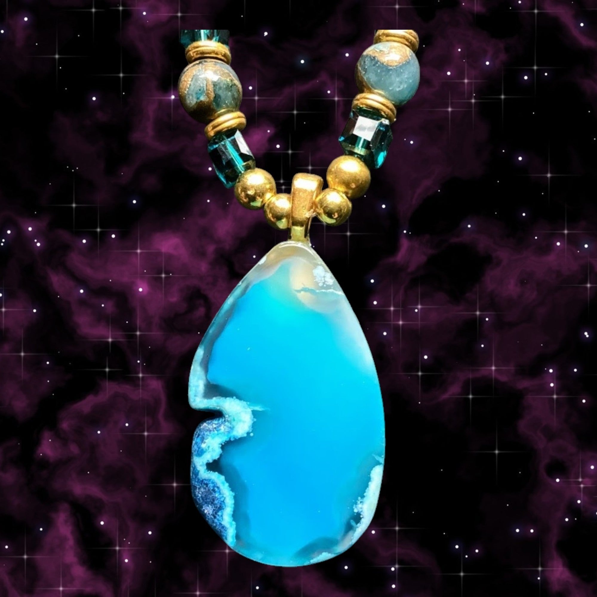 Heartfelt Creations Celestial Tear Pendant Necklace: vibrant blue agate teardrop pendant with gold-tone beads and teal crystal accents.