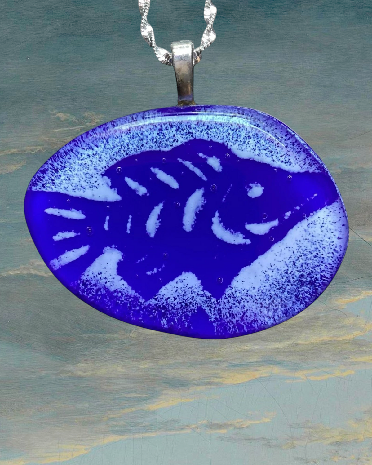 Heartfelt Creations handcrafted fused glass pendant featuring a deep blue fish motif on a silver-tone chain