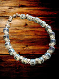 Heartfelt Creations blue faceted bead bracelet with silver-toned spacers. Shimmering translucent beads catch the light.