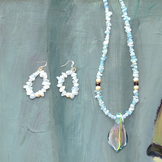 Heartfelt Creations unique necklace and earring set is crafted with light blue Blue Chalcedony chips and an incredible handmade dichroic glass pendant. This is a STUNNER!!!!