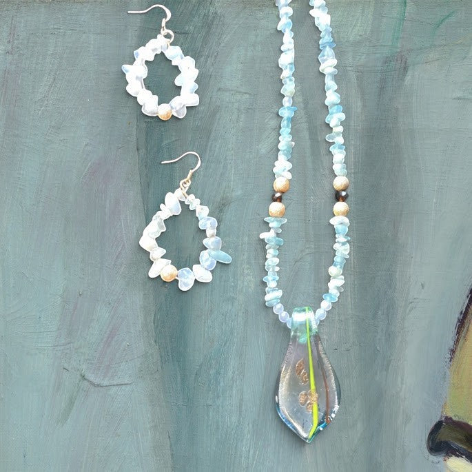 Heartfelt Creations unique necklace and earring set is crafted with light blue Blue Chalcedony chips and an incredible handmade dichroic glass pendant. This is a STUNNER!!!!