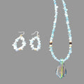 Heartfelt Creations unique necklace and earring set is crafted with light blue Blue Chalcedony chips and an incredible handmade dichroic glass pendant. This is a STUNNER!!!!