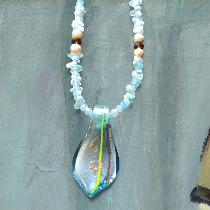 Heartfelt Creations unique necklace and earring set is crafted with light blue Blue Chalcedony chips and an incredible handmade dichroic glass pendant. This is a STUNNER!!!!