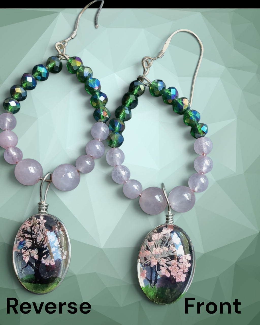 Heartfelt Creations beaded drop earrings with rose quartz, green crystal beads, and oval cherry blossom pendants.