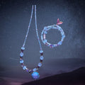 Heartfelt Creations beaded necklace and bracelet set in lavender, periwinkle, and purple with druzy pendant and mermaid tail charm.