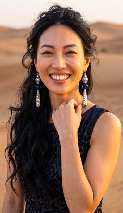 Heartfelt Creations artisan drop earrings featuring cobalt blue glass spheres and silver twisted teardrop pendants.