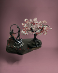 Heartfelt Creations handcrafted sculpture featuring a dancing couple and a wire-wrapped beaded tree on a stone base.