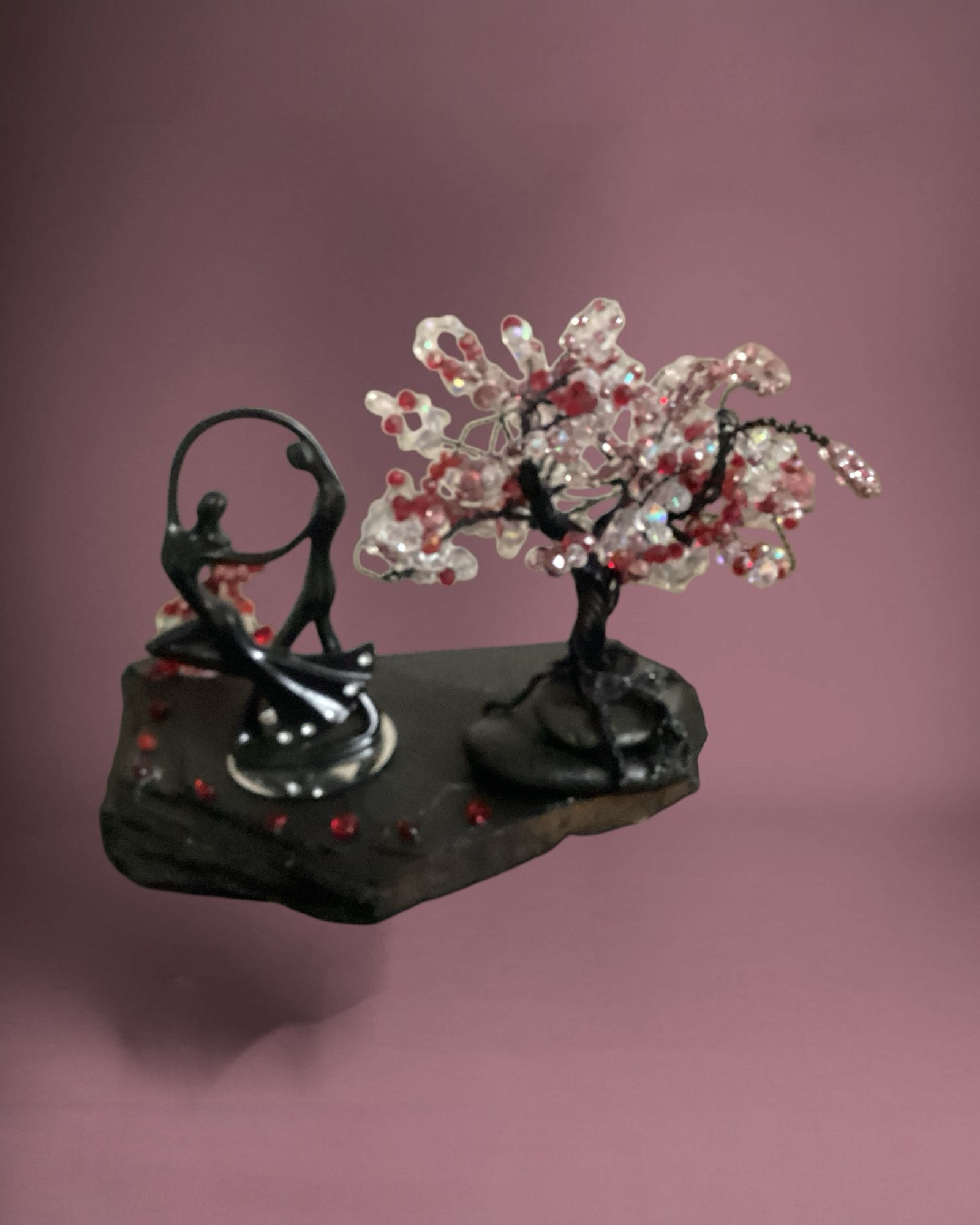 Heartfelt Creations handcrafted sculpture featuring a dancing couple and a wire-wrapped beaded tree on a stone base.