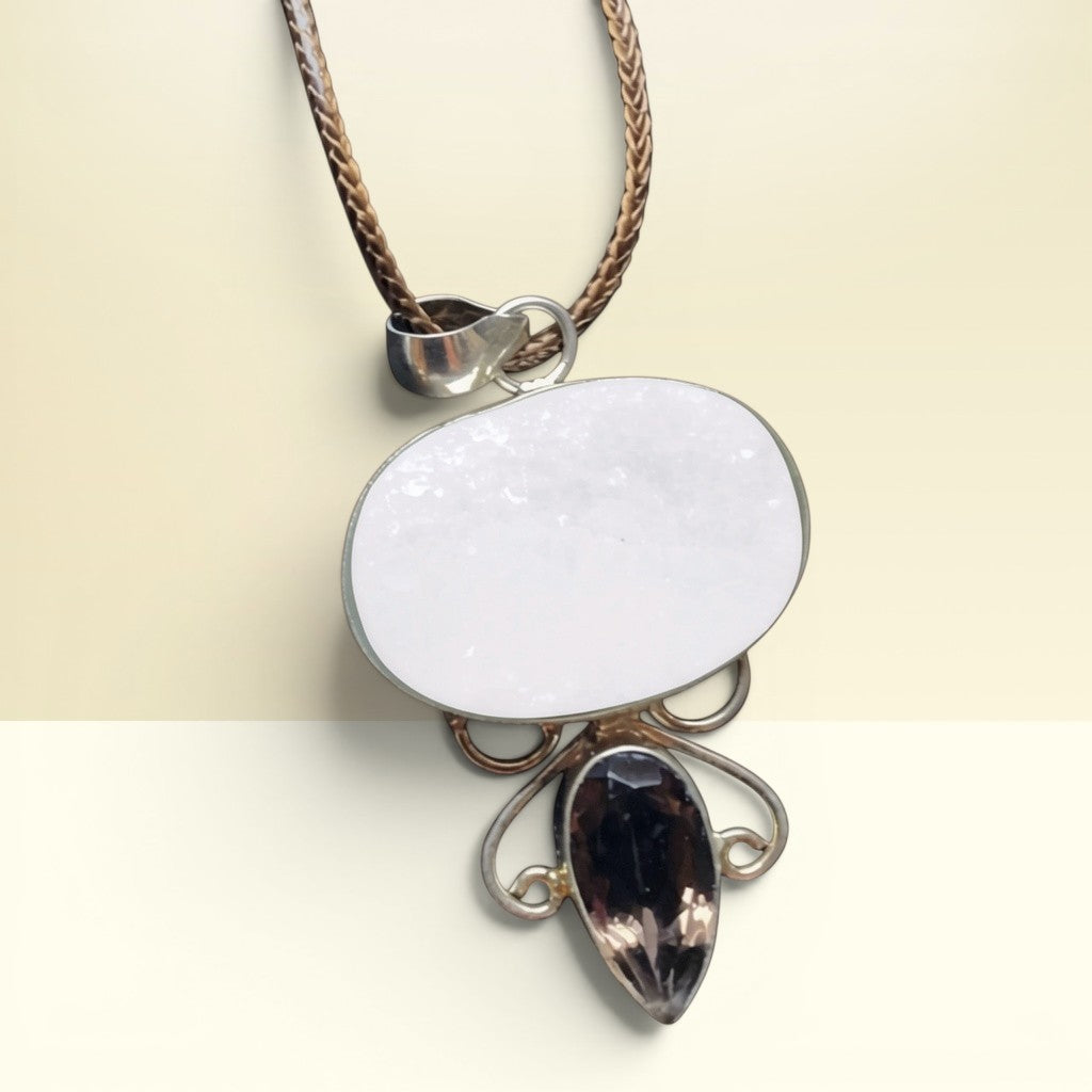 Heartfelt Creations artisan pendant with oval white druzy and smoky quartz drop on a braided cord necklace
