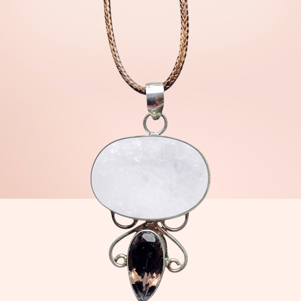 Heartfelt Creations artisan necklace with oval druzy and smoky quartz pendant on a braided cord with filigree details.