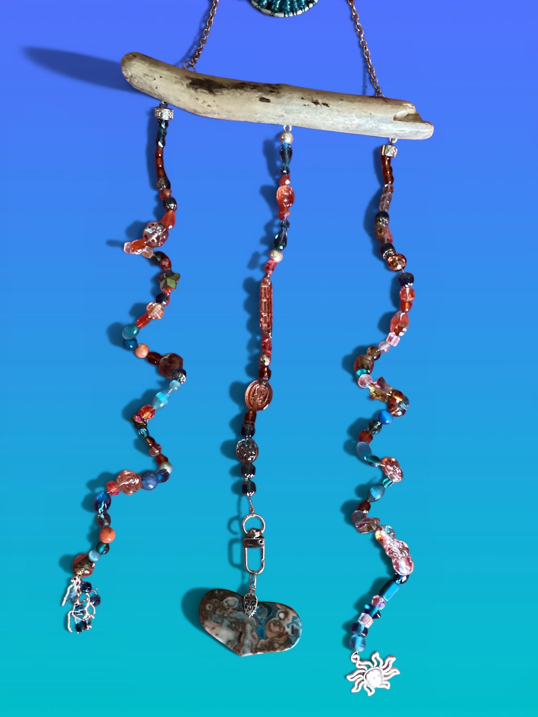 Heartfelt Creations exotic suncatcher with driftwood, turquoise, gold glass, crystal beads, and heart stone.
