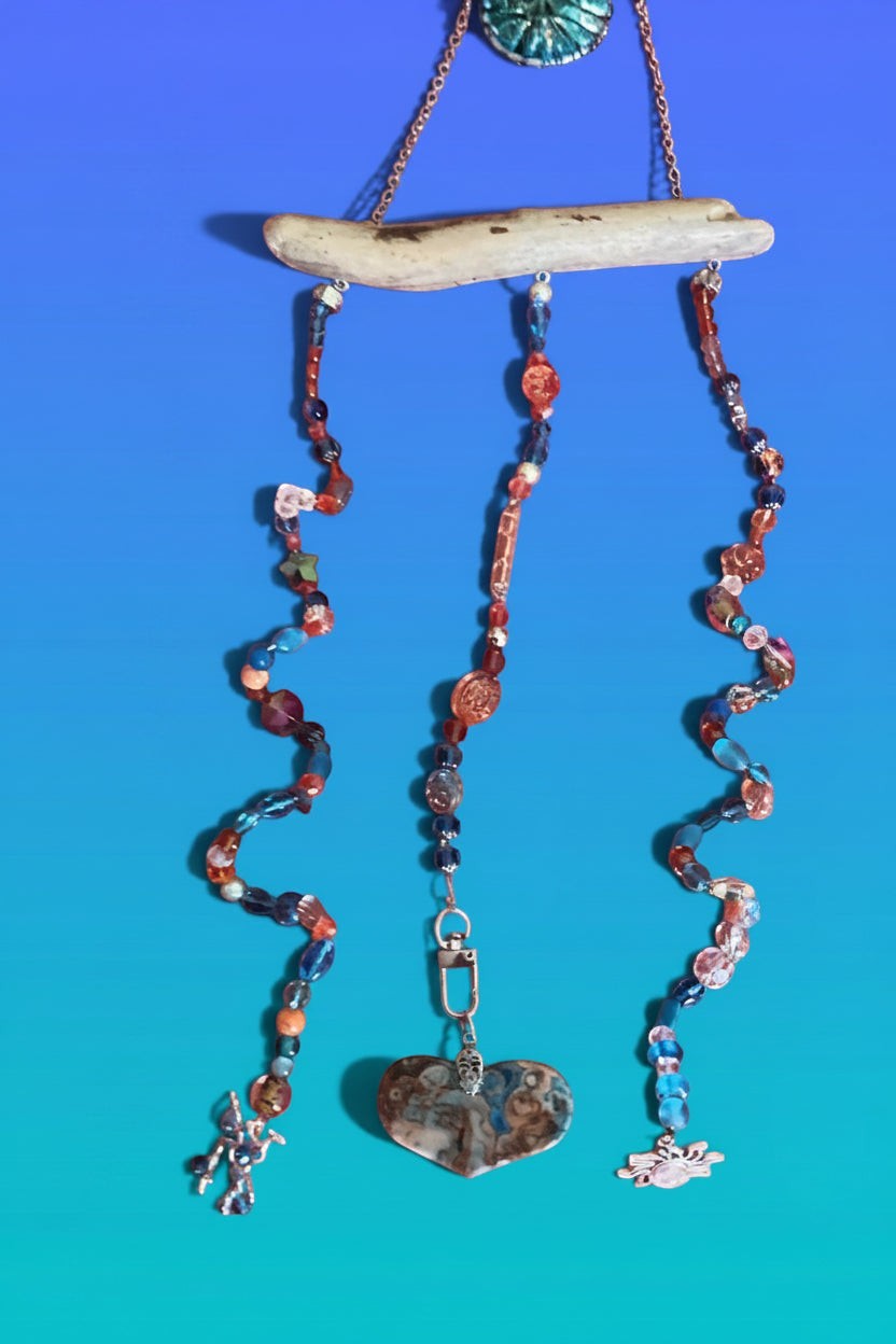 Heartfelt Creations exotic suncatcher with driftwood, turquoise, gold glass, crystal beads, and heart stone.