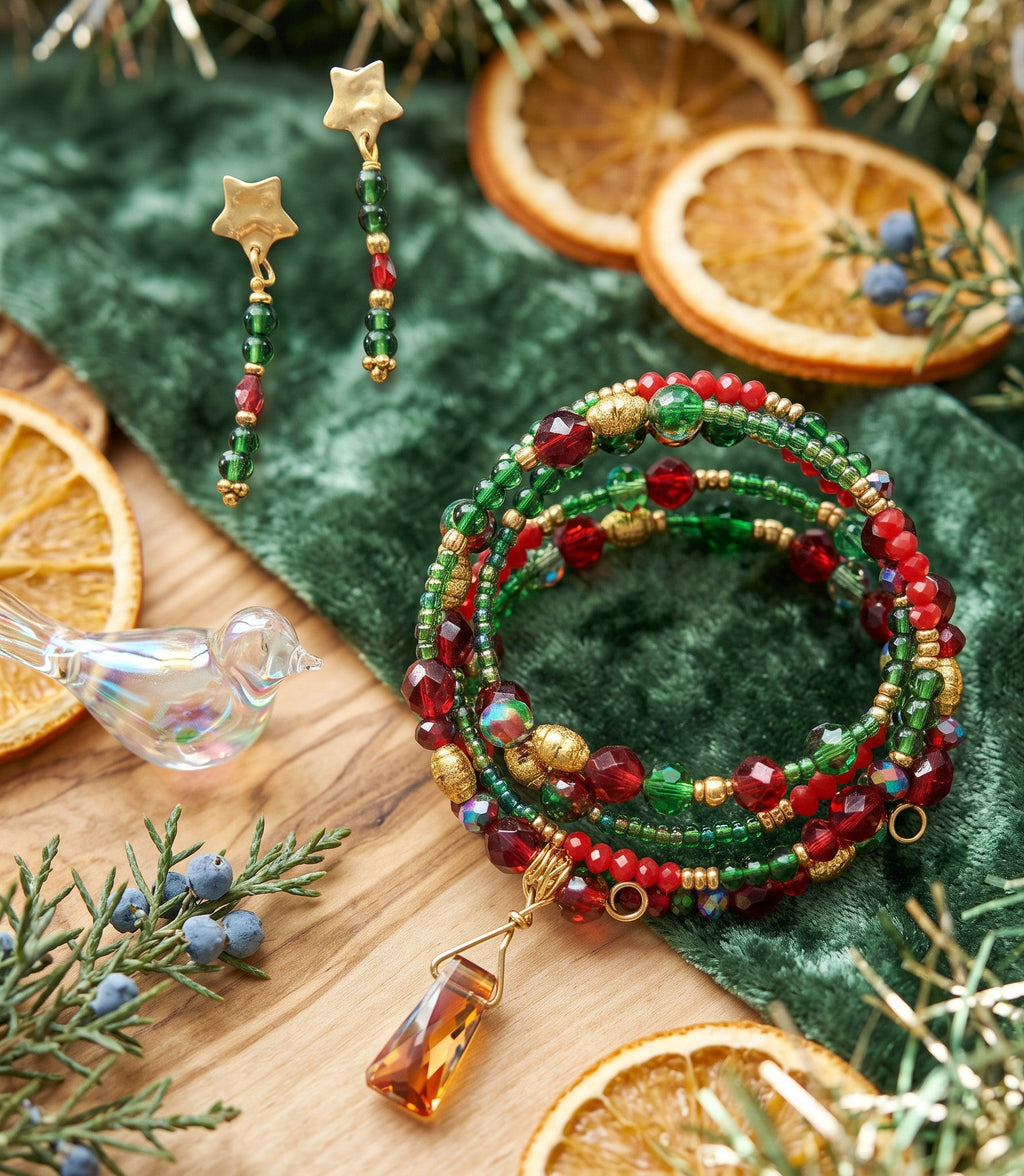 Heartfelt Creations festive jewelry set with a red, green, and gold beaded wrap bracelet and dangling star earrings.