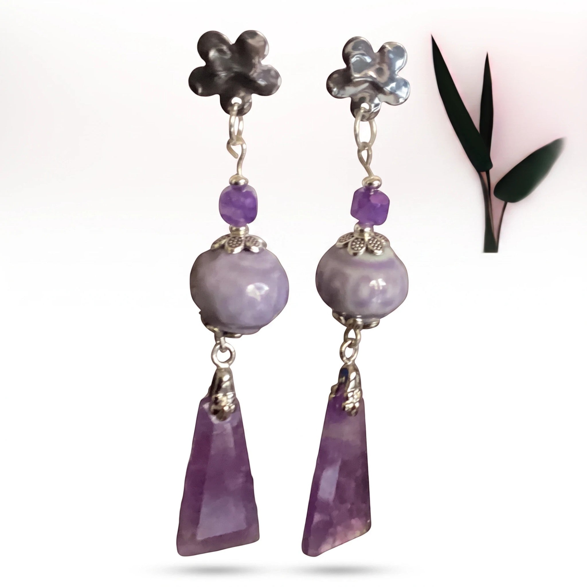 Heartfelt Creations floral dangle earrings featuring silver flower studs, lilac ceramic beads, and amethyst pendants.