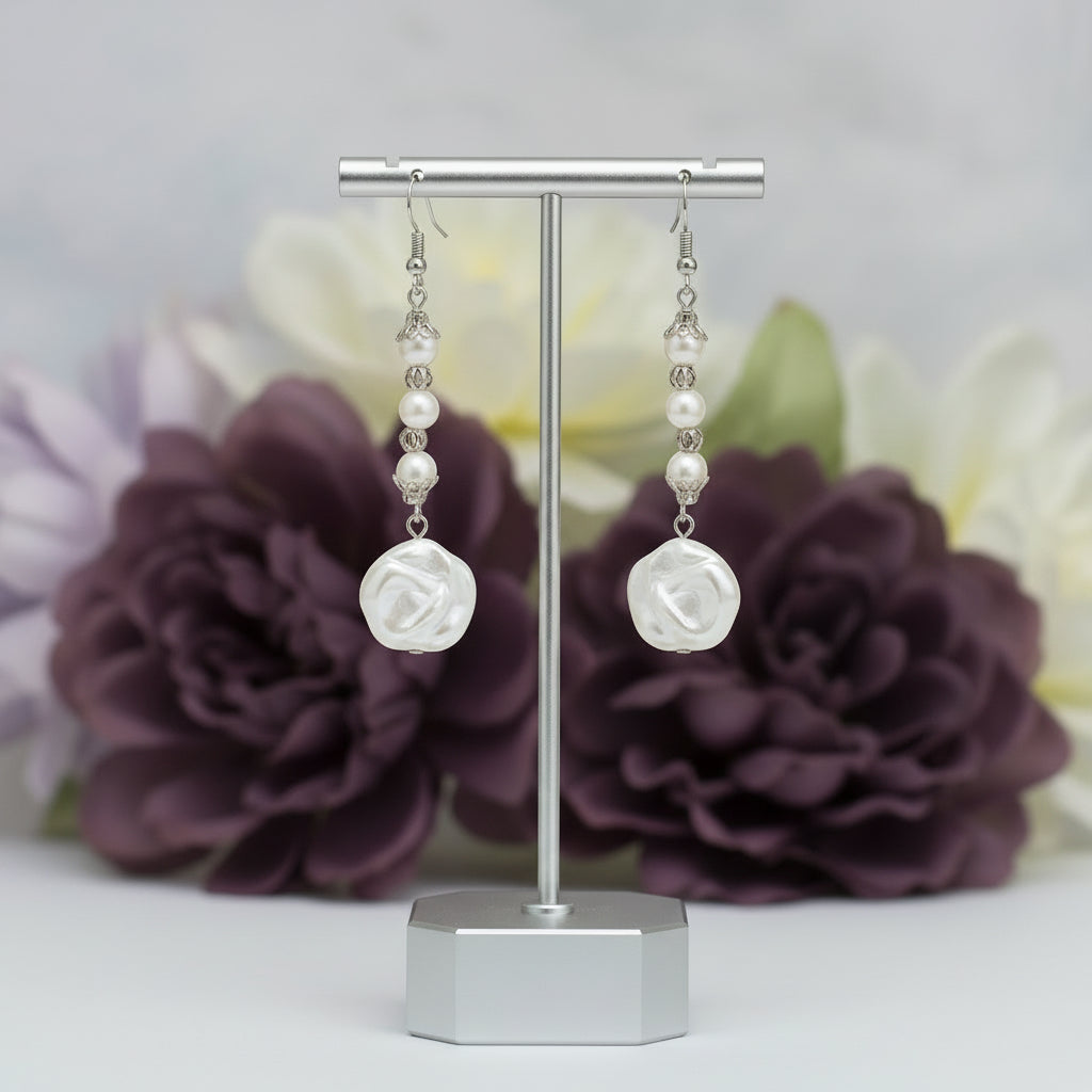 Heartfelt Creations elegant floral drop earrings with faux pearls and vintage-inspired silver filigree on dark stone